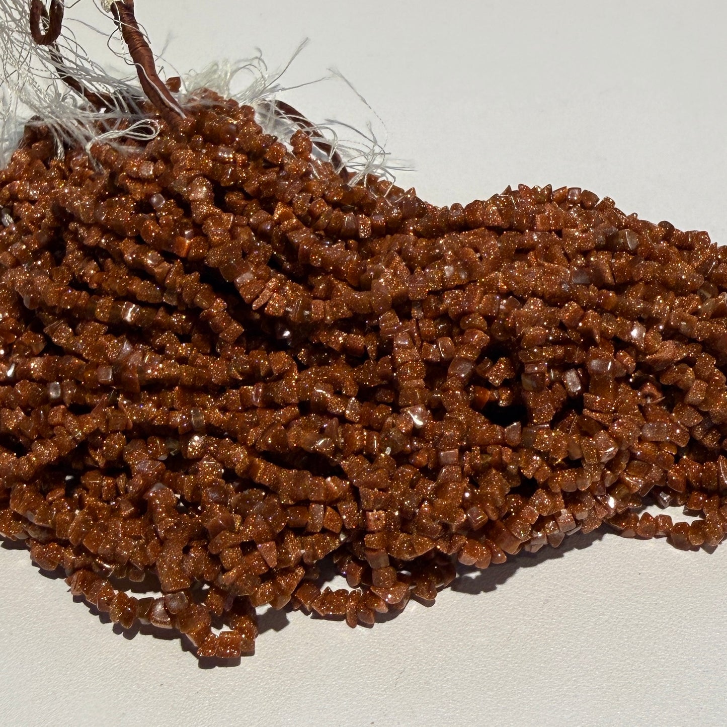 Goldstone Chips, top quality!  15" Strands, lots of sparkle approx 5 mm