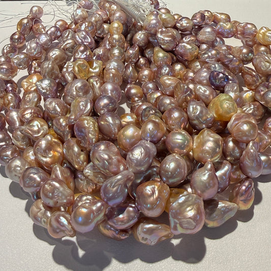 Multi Color Baroque Pearls 12-14mm 15" strands purple and golden purple.