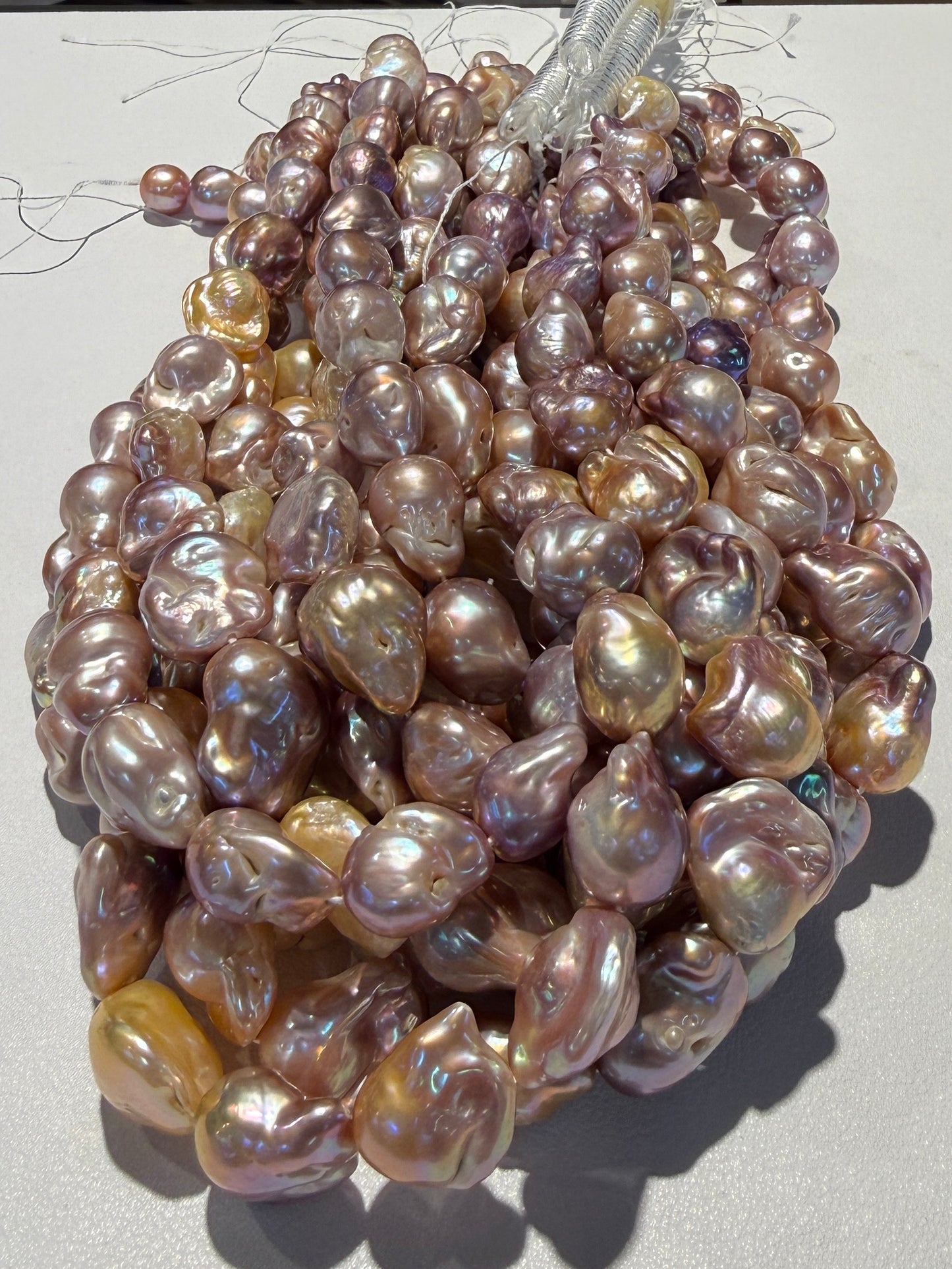 Multi Color Baroque Pearls 12-14mm 15" strands purple and golden purple.