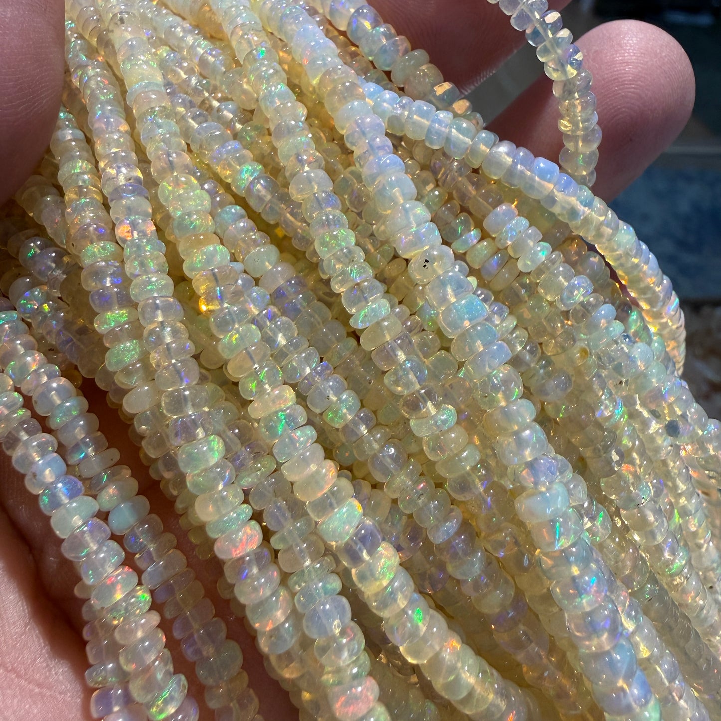 White Base Opal 3-4mm 15" strands. Lots of fire