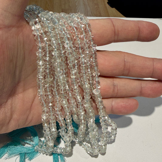 Genuine Aquamarine 5mm faceted roundels. approx 15" strands $10 a strand