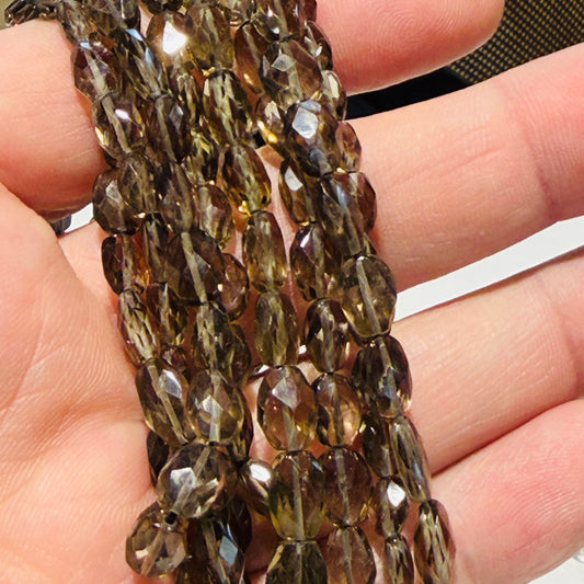 Smokey Quartz beads, faceted, nice quality, approx 15" strands, $10 a strand!