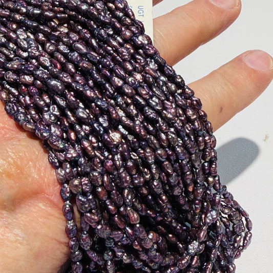 Keshi Rice Pearls, Peacock Purple color, approx 15" 2x4mm, 2 Strands for $10!