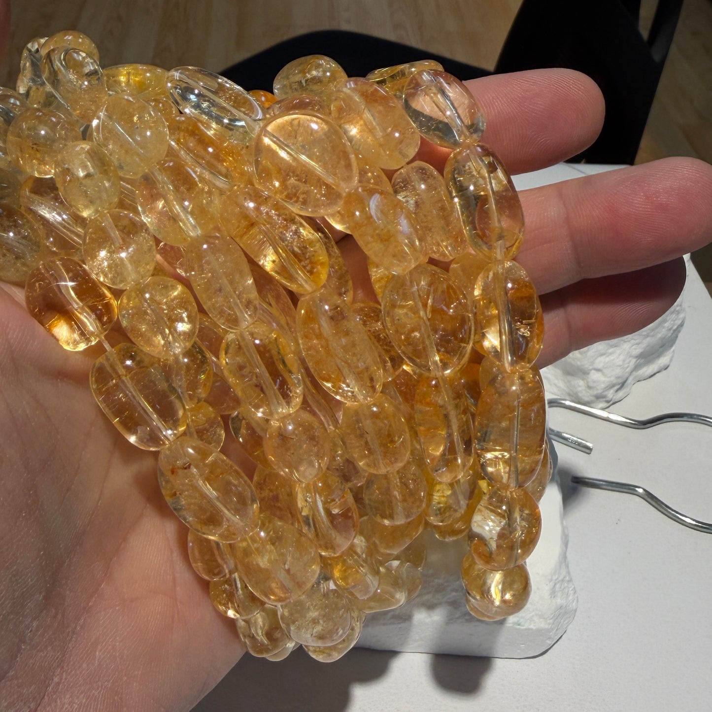 Citrine smooth ovals, irregular shape.  Approx 10x15mm 15" strands