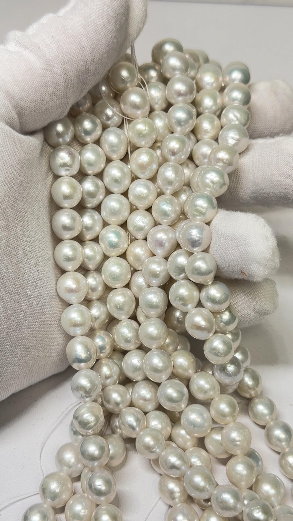 Strands of Pearls on a White Glove