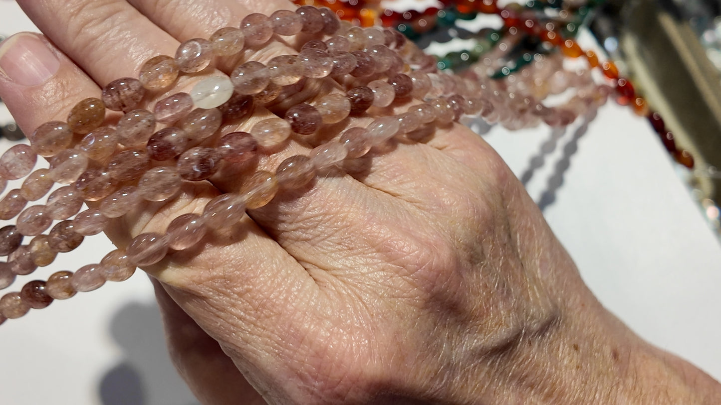 Natural gemstones 6x8mm approx 16" strands flat olive shape.  $10 a strand!