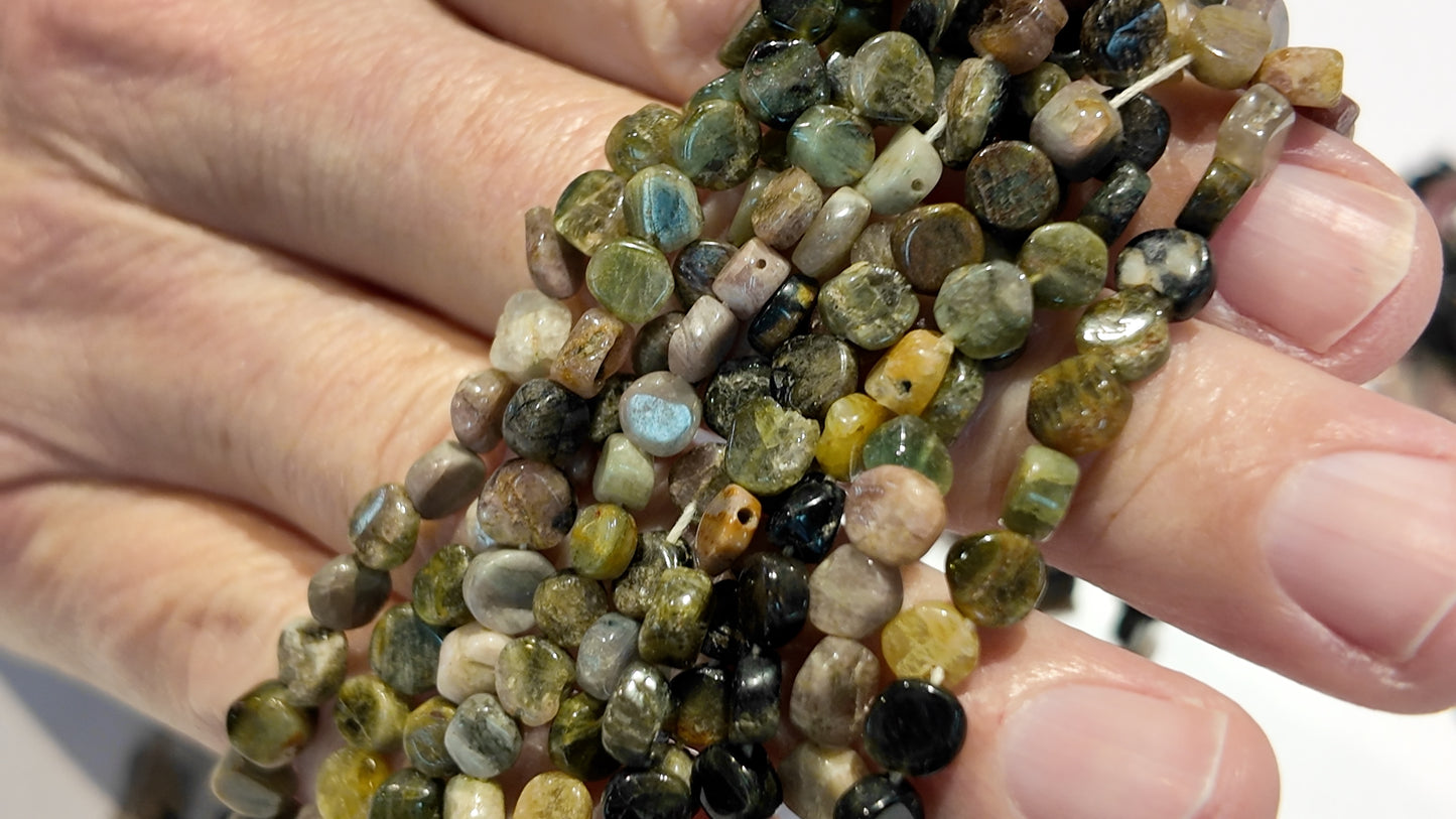 Tourmaline Beads Translucent/Transparent.  Primitive cut approx 15" strands.  Natural